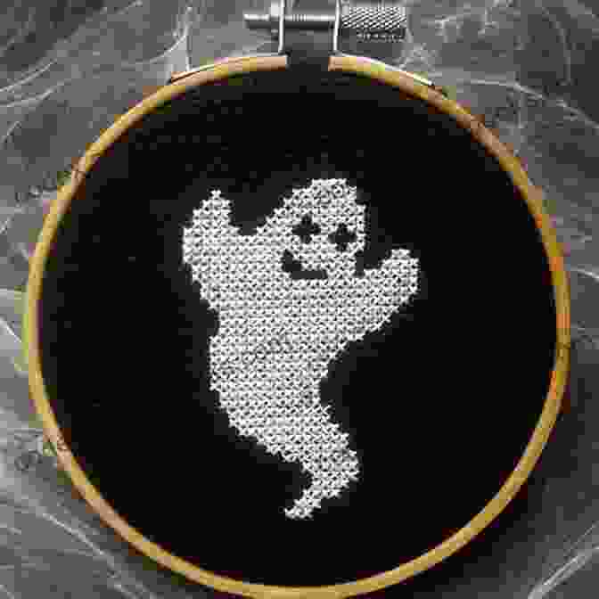 A Ghost Cross Stitch Hanging From A Tree Halloween Cross Stitch Patterns: 5 Festive Cross Stitch Patterns