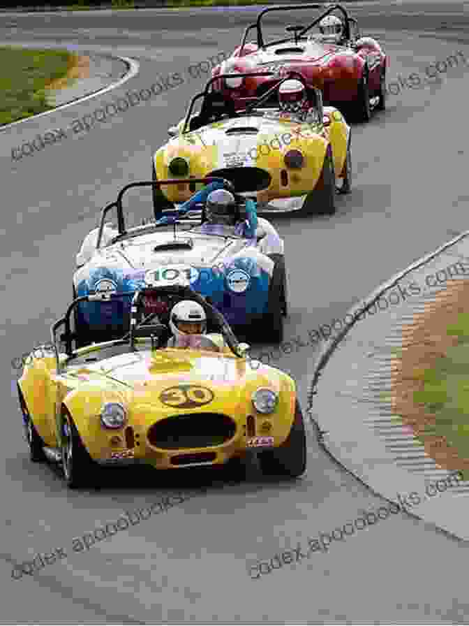 A Group Of Vintage Shelby Cobras Lined Up On A Race Track Shelby And AC Cobra Baby Professor