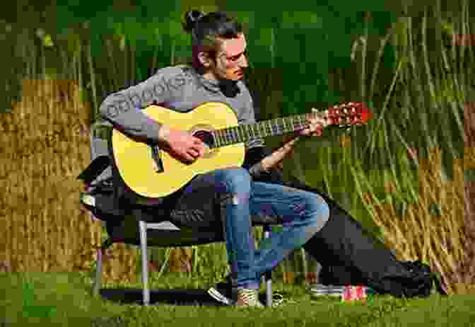 A Guitarist Strumming An Acoustic Guitar In A Vibrant Setting New Acoustic Music For Folk Ensemble