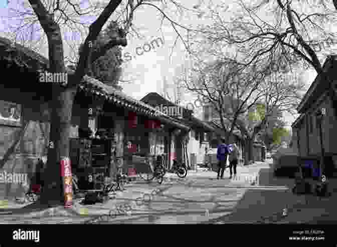 A Narrow, Winding Alleyway In A Hutong Neighborhood, Lined With Traditional Courtyard Houses And Brimming With Local Life. Beijing: A Photographic Journey Beautiful World Escapes