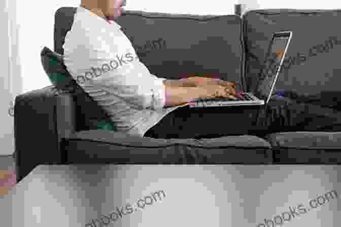 A Person Working On A Laptop While Sitting On The Couch With Their Family Finding Your Balance Between Business And Family