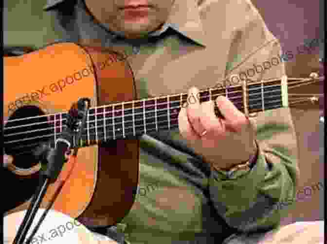 Image Of A Flatpicking Guitar Player Guitar Picking Tunes Flatpicking Classics