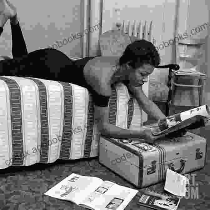 Maya Angelou Writing At Her Desk, Surrounded By Her Books A Study Guide For Maya Angelou S On The Pulse Of The Morning (Poetry For Students)