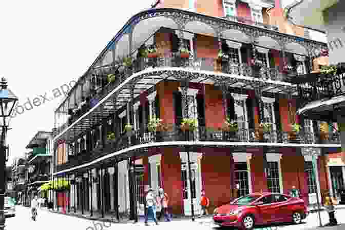 Tourists Exploring A Hidden Courtyard In The French Quarter Of New Orleans, Surrounded By Lush Greenery And Colorful Buildings New Orleans City Guide Berlitz Publishing