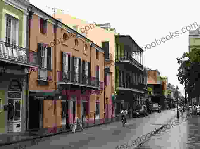 Vibrant Street Scene In The French Quarter Of New Orleans With Colorful Buildings, Street Performers, And Tourists New Orleans City Guide Berlitz Publishing